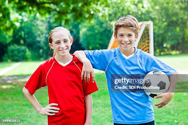 friendly opposing team soccer players before game - gender symbol stock pictures, royalty-free photos & images