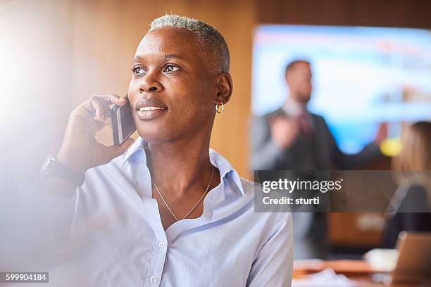 talking business - androgynous stock pictures, royalty-free photos & images