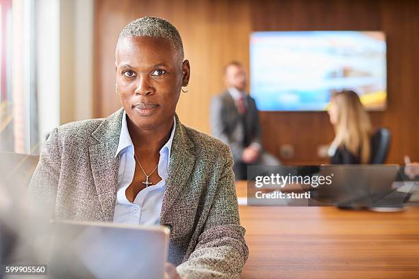 business meeting - androgynous professional stock pictures, royalty-free photos & images