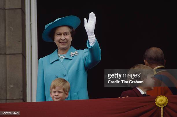Queen Elizabeth II with Prince Harry and Prince William on the balcony at Buckingham Palace for Trooping The Colour, 11th July 1988.