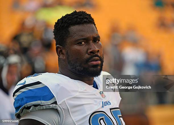 Defensive lineman Wallace Gilberry of the Detroit Lions looks on from the field before a National Football League preseason game against the...