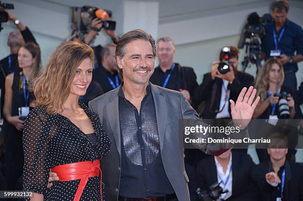 Beppe Convertini and Alessandra Carrillo attend the premiere of 'Jackie' during the 73rd Venice Film Festival at Sala Grande on September 7, 2016 in...