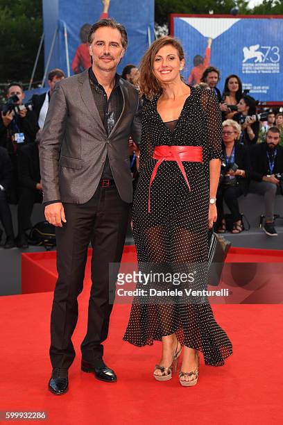 Beppe Convertini and Alessandra Carrillo attend the premiere of 'Jackie' during the 73rd Venice Film Festival at Sala Grande on September 7, 2016 in...