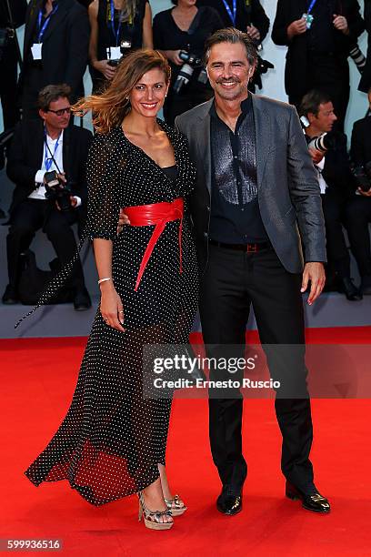 Alessandra Carrillo and Beppe Convertini attend the premiere of 'Jackie' during the 73rd Venice Film Festival at Sala Grande on September 7, 2016 in...