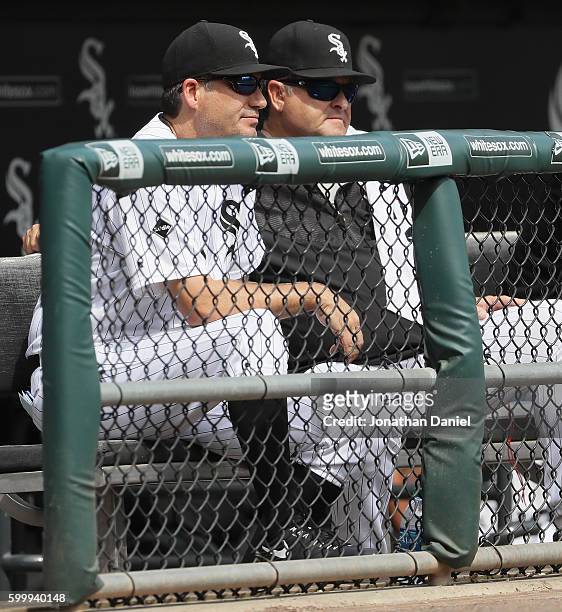 Manager Robin Ventura and pitching coach Don Cooper of the Chicago White Sox watch as their team takes on the Detroit Tigers at U.S. Cellular Field...