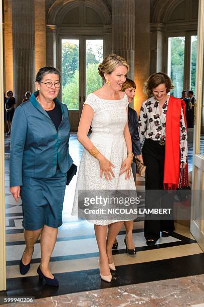 Katharina Schneider-Ammann and Queen Mathilde of Belgium arrive for a gala dinner at the Laeken Royal Palace in Brussels, for the thirteenth informal...