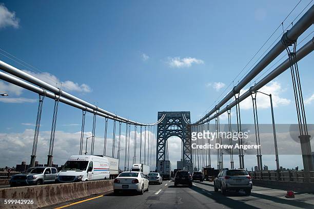Cars travel across the George Washington Bridge, September 7, 2016 over the Hudson River between Fort Lee, New Jersey and New York City. Jury...