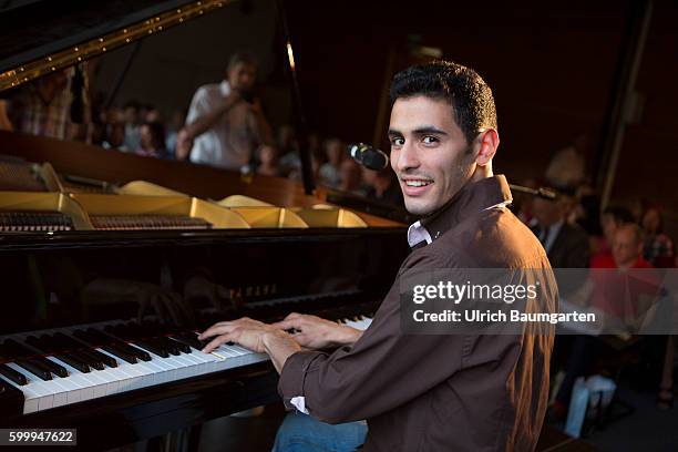 Aeham Ahmad - "The pianist in the rubble"-. Aeham Ahmad despite war and distress in Syria with music. With his piano he moved trough the wreckage of...