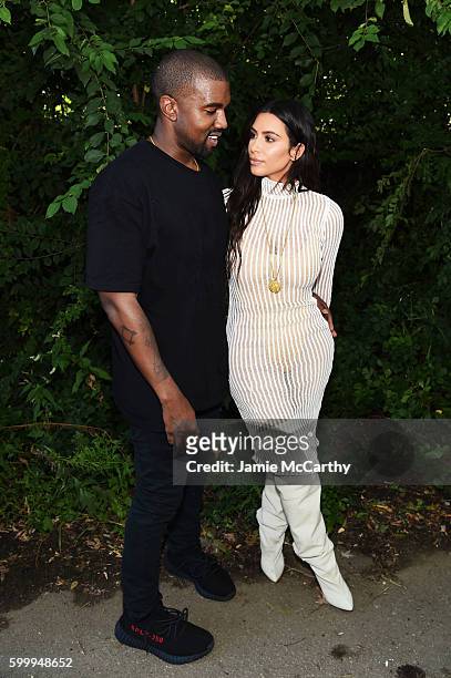 Kanye West and Kim Kardashian attend the Kanye West Yeezy Season 4 fashion show on September 7, 2016 in New York City.