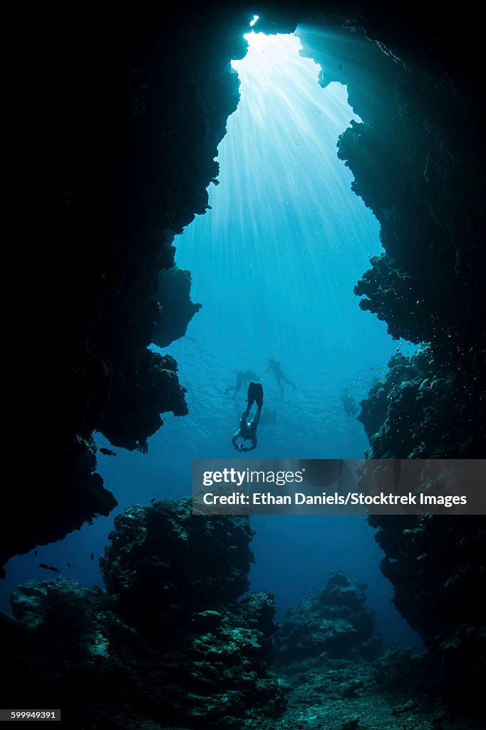 Sunlight descends underwater and into a crevice on Palaus barrier reef.