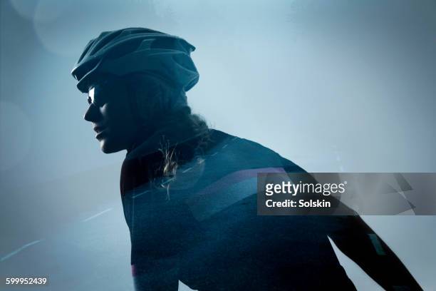 female cyclist and road, double exposure - multiple exposure sport stock pictures, royalty-free photos & images