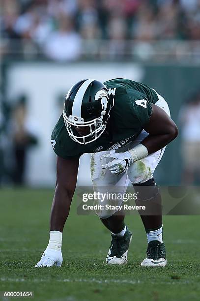 Malik McDowell of the Michigan State Spartans anticipates a play during a game against the Furman Paladins at Spartan Stadium on September 2, 2016 in...