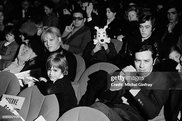 French actor Alain Delon with his wife actress Nathalie Delon and their son Anthony at the premiere of the film Tintin, in Paris.