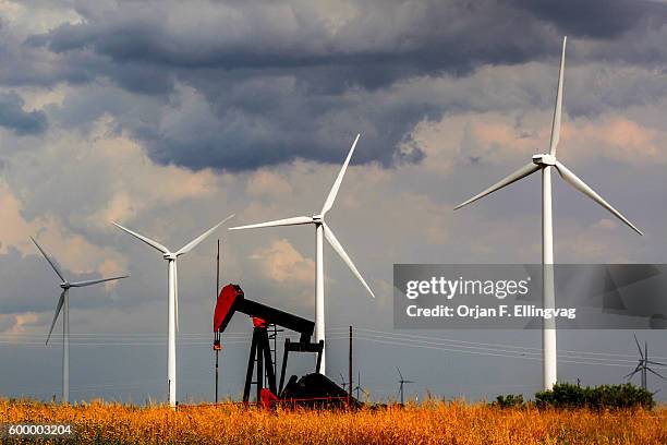 Sweetwater in Texas aims to be the windpower capitol of the world. A pumpjack siphons oil in the foreground. Best known for the annual Rattlesnake...