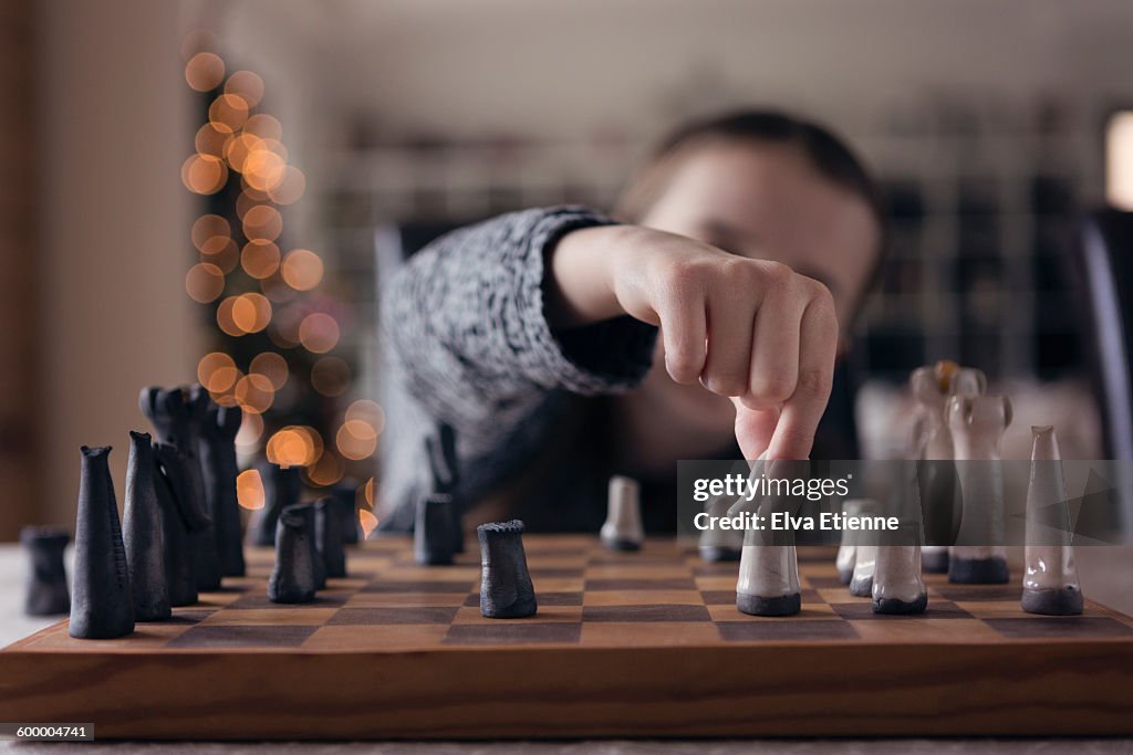 Child playing chess