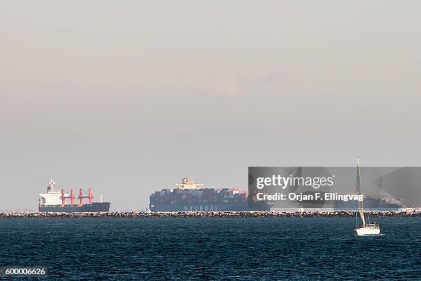 Cargo ship are lined up outside the Port of LA and Long Beach, waiting to load and offload. Due to the ongoing conflict between Pacific Maritime...