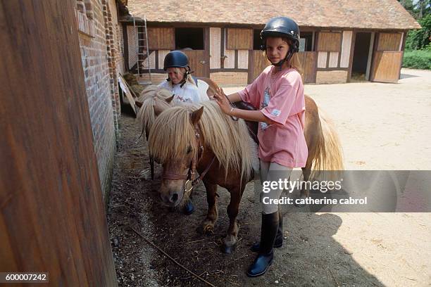 Athina Onassis Roussel, grand-daughter of Greek shipping magnate Aristotle Onassis at riding stables.