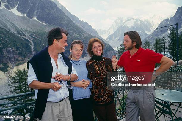 French actors Jacques Denis, Catherine Frot and Anny Duperey and French actor and director Bernard Giraudeau on the set of Giraudeau's television...