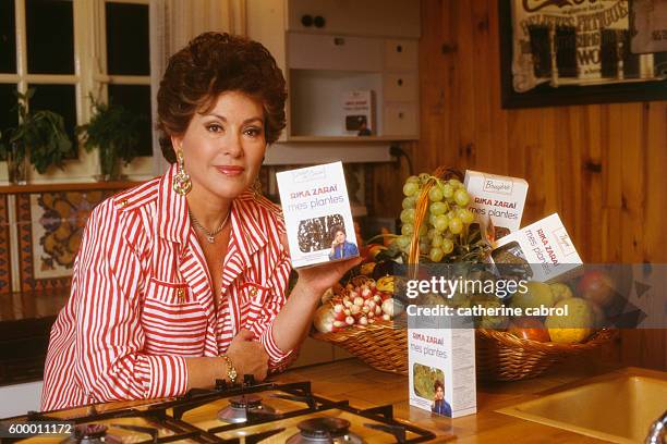 Israeli singer Rika Zaraï pour during the promotion of her book "Mes Plantes".