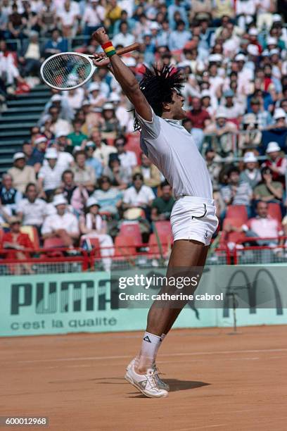 Tennis player Yannick Noah wins his match at the 1983 Monte-Carlo tennis championships.