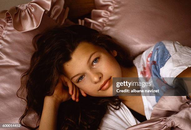Ukrainian-born American model and actress Milla Jovovich relaxes in her mother's house in Los Angeles.