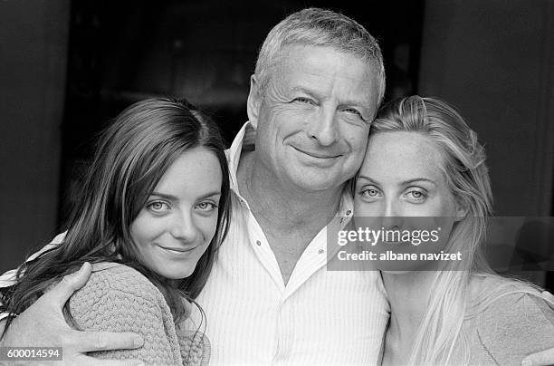 French chairman of Clarins cosmetics Christian Courtin-Clarins with his two daughters, Virginie and Claire .
