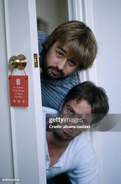 French actor Christophe Lambert with director, screenwriter and producer Luc Besson on the set of his movie Subway.