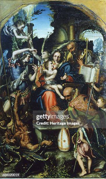 Holy Family with Saint Michael the Archangel and the Devil Contending for Souls, Saint Bernhard and the Angels, c.1535. Found in the collection of...