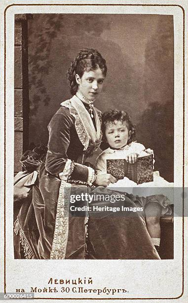 Empress Maria Fyodorovna with son Nicholas Alexandrovich of Russia, 1872. Found in the collection of State Hermitage, St. Petersburg. Artist :...