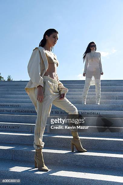 Kendall Jenner and Kim Kardashian attend the Kanye West Yeezy Season 4 fashion show on September 7, 2016 in New York City.