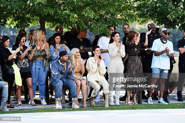 Tyga, Kylie Jenner, Kendall Jenner, Kim Kardashian, Carine Roitfeld and Pharrell Williams attend the Kanye West Yeezy Season 4 fashion show on...