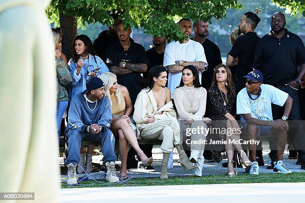 Tyga, Kylie Jenner, Kendall Jenner, Kim Kardashian, Carine Roitfeld and Pharrell Williams attend the Kanye West Yeezy Season 4 fashion show on...