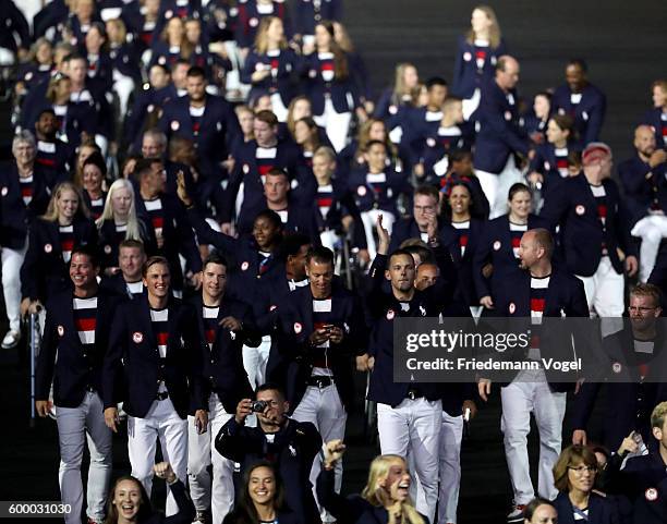 Athletes of the United States delegation enter the stadium during the Opening Ceremony of the Rio 2016 Paralympic Games at Maracana Stadium on...