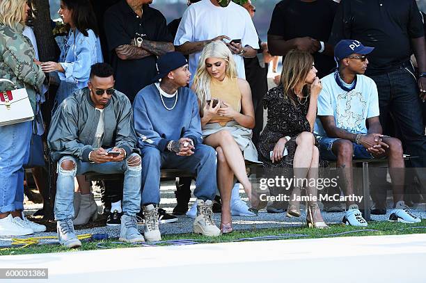 Tyga, Kylie Jenner, Carine Roitfeld and Pharrell Williams attend the Kanye West Yeezy Season 4 fashion show on September 7, 2016 in New York City.