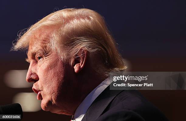 Republican presidential candidate Donald Trump speaks while accepting the Conservative Party of New York State's nomination for president on...