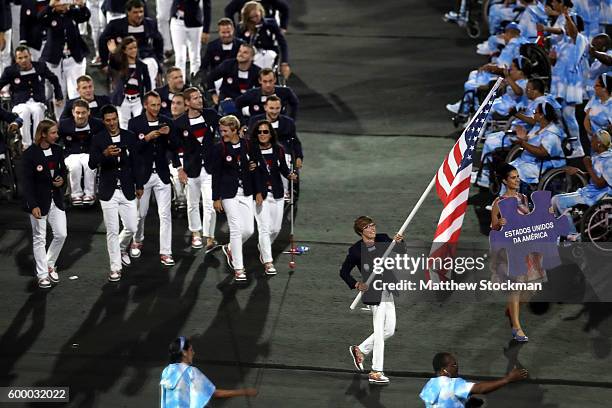 Flag bearer Allison Jones leads Team USA during the Opening Ceremony of the Rio 2016 Paralympic Games at Maracana Stadium on September 7, 2016 in Rio...