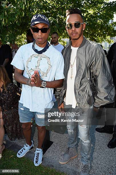 Pharrell Williams and Lewis Hamilton attend the Kanye West Yeezy Season 4 fashion show on September 7, 2016 in New York City.