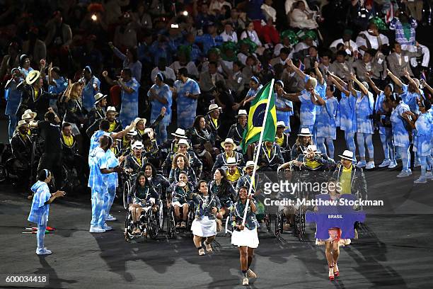 Flag bearer Shirlene Coelho leads Team Brazil during the Opening Ceremony of the Rio 2016 Paralympic Games at Maracana Stadium on September 7, 2016...