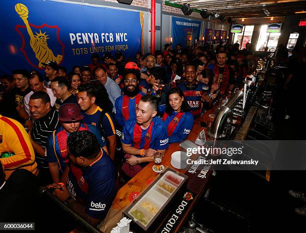 Fans crowd Smithfield Hall for a luncheon hosted by the Official NYC FC Barcelona Penya Club to celebrate FC Barcelona's arrival to New York on...