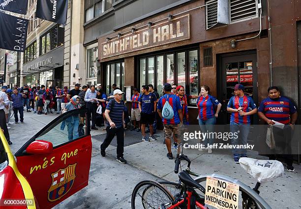 Fans line up outside Smithfield Hall for a luncheon hosted by the Official NYC FC Barcelona Penya Club to celebrate FC Barcelona's arrival to New...
