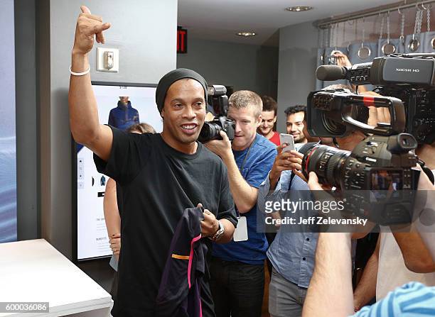 Ronaldhino greets FC Barcelona fans at Niketown to celebrate the Club's arrival to New York on September 7, 2016 in New York City.