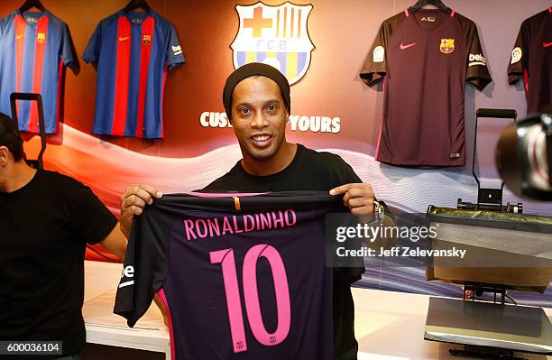 Ronaldhino displays his customized jersey at Niketown to celebrate the Club's arrival to New York on September 7, 2016 in New York City.
