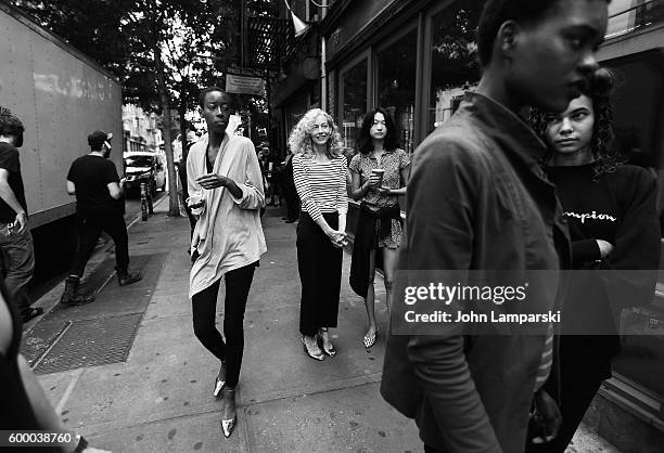 Models prepare backstage at the Rachel Comey presentation during New York Fashion Week on September 7, 2016 in New York City.