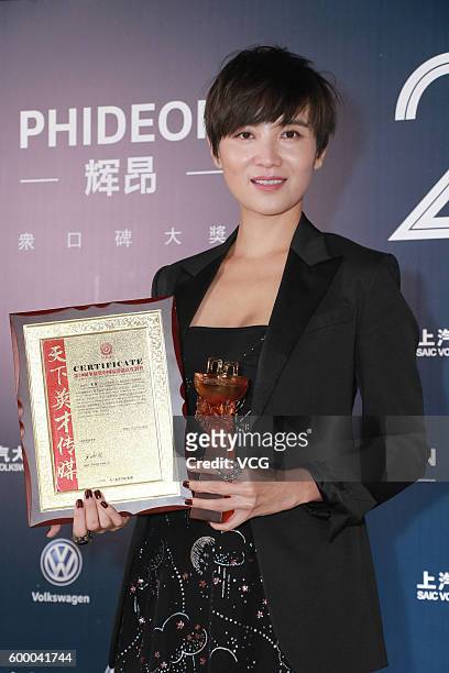 Actress Song Jia poses during the 20th Huading Awards and China Film Satisfaction Survey Release Ceremony at Kowloon Bay International Trade &...