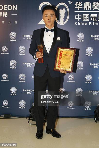 Actor Max Zhang Jin poses during the 20th Huading Awards and China Film Satisfaction Survey Release Ceremony at Kowloon Bay International Trade &...