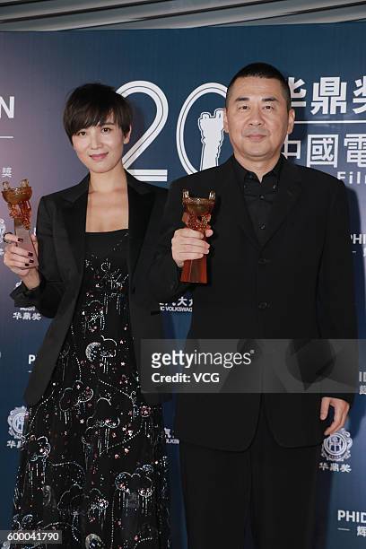 Actor Chen Jianbin and actress Song Jia pose during the 20th Huading Awards and China Film Satisfaction Survey Release Ceremony at Kowloon Bay...