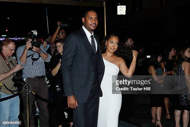 Carmelo Anthony and La La Anthony attend the Tom Ford Fall 2016 fashion show during New York Fashion Week September 2016 at The Four Seasons on...