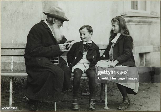 Leo Tolstoy with grandchildren Leo and Sofia, 1909. Found in the collection of State Museum Yasnaya Polyana Estate, near Tula. Artist : Chertkov,...