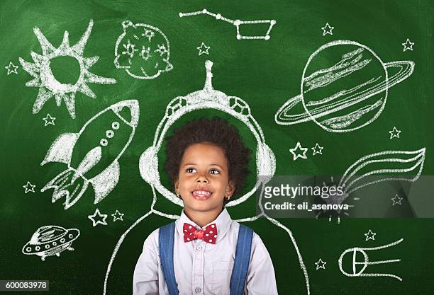 childhood imagination - space suit stock pictures, royalty-free photos & images