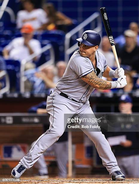 Oswaldo Arcia of the San Diego Padres at bat during the game against the Miami Marlins at Marlins Park on August 27, 2016 in Miami, Florida.